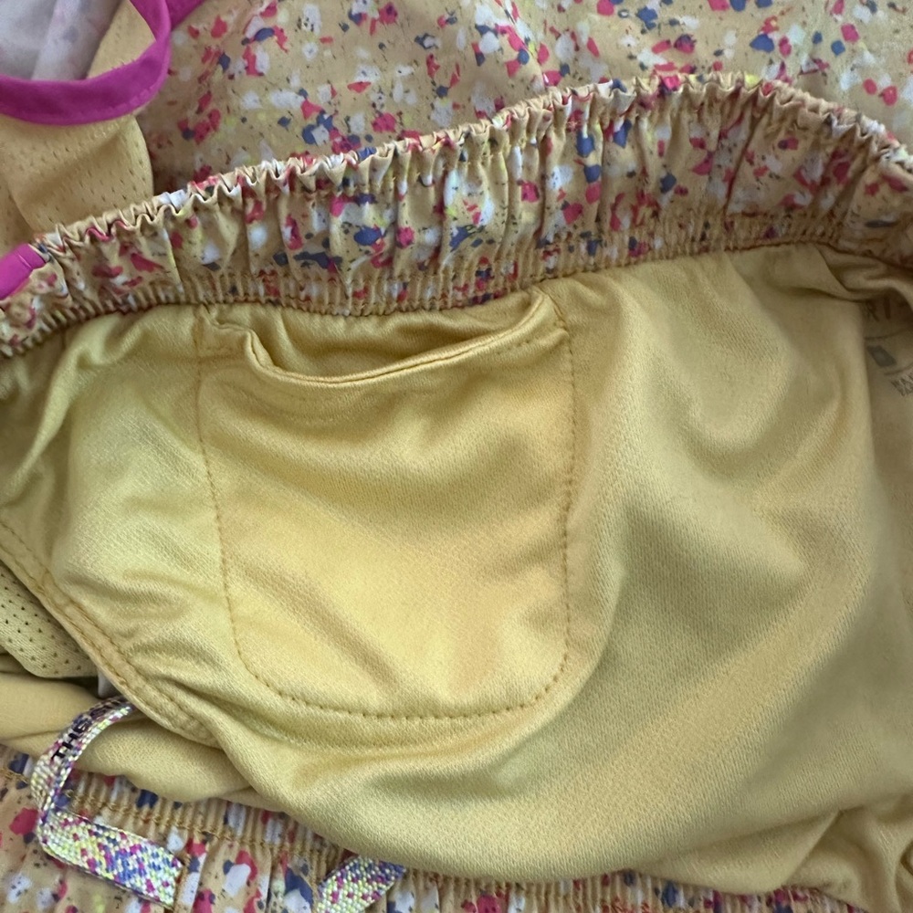 Nike,size medium, multiple color dots